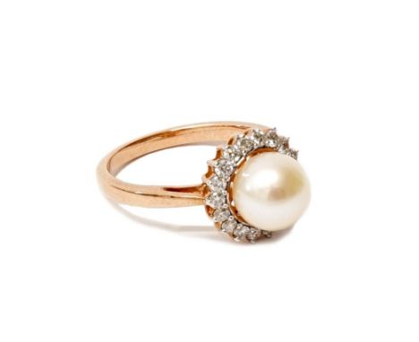 A 9ct rose gold pearl and diamond ring size N - approx diamond weight 0.37ct 