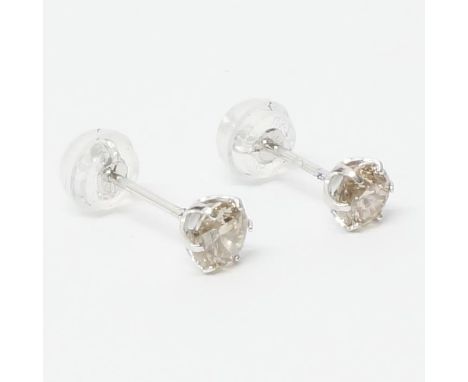 A pair of platinum 6-claw set diamond studs with rubber-capped butterflies, boxed - round brilliant cut diamonds 0.60ct - app