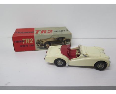 Triumph TR2 Sports electric toy 1/18th scale by Victory Industries Surrey - original box etc - in good overall condition 