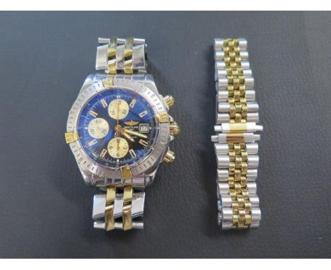 A gents steel and gold Breitling Chronomat Evolution Automatic Chronograph bracelet watch 'A13356' with blue dial - case appr