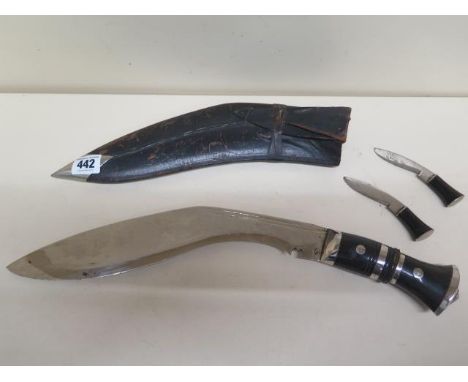 A good quality Ghurka Kukri and scabbard 