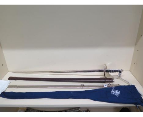 A Second World War British Army dress sword and scabbard recently re furbished to a very high standard with glove and a case 