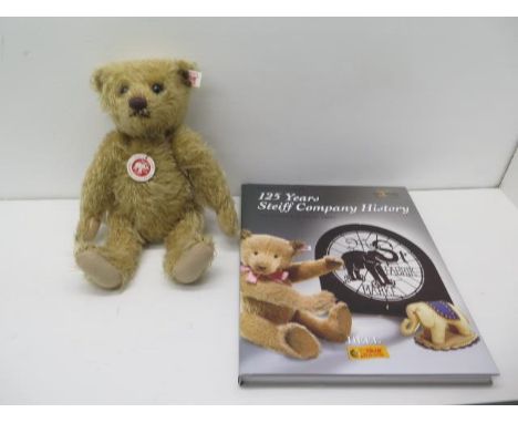 A Steiff collectors bear 'Marmaduke' Limited Edition - approx 28cm - together with a book on The History of The Steiff Compan