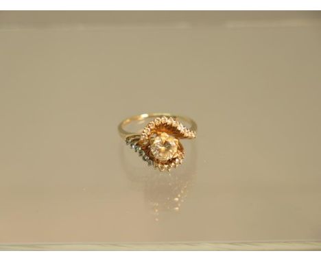 A 9ct yellow gold (hallmarked) dress ring with white stones - ring size M/N - weight approx 3.6 grams 