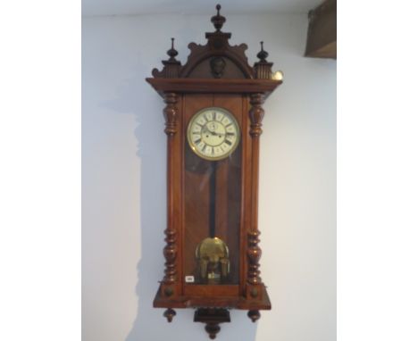 An 8 day double weight Vienna wall clock in a mahogany case 