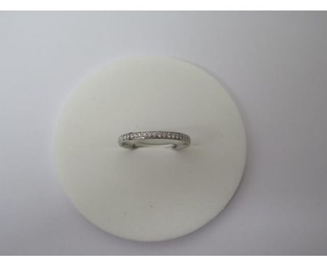 A Platinum (hallmarked) and diamond half eternity ring - size K/L - weight approx 2 grams 