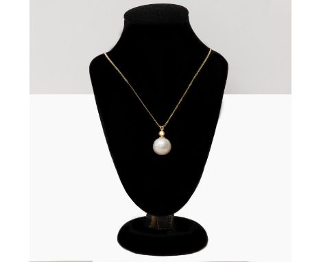 A large 9ct yellow gold cultured pearl and citrine pendant on a gold-plated silver chain 