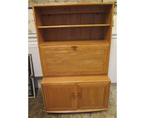 A blonde elm Ercol bureau cabinet with a fitted interior over two doors - Width 92cm x Height 148cm 