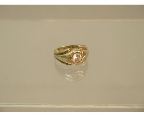 A 9ct yellow gold (hallmarked) gents ring with CZ - ring size R - weight approx 4.7 grams 