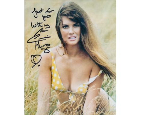 Caroline Munro James Bond actress signed sexy 10 x 8 inch colour swim suit photo. Good Condition. All autographs come with a 