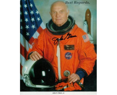 Astronaut John Glenn signed 8 x 6 inch colour Orange Space Suit Shuttle photo. Good Condition. All autographs come with a Cer