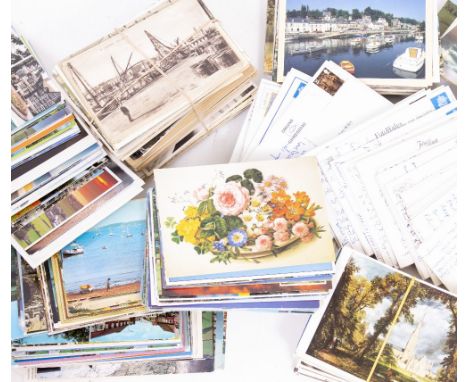A COLLECTION OF TOPOGRAPHICAL POSTCARDS some in albums and some loose, to include scenes of towns, trips to China and Japan, 