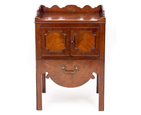 A GEORGE III MAHOGANY TRAY TOP COMMODE with twin doors above a drawer base, with square legs, 54.5cm wide x 46.5cm deep x 80c