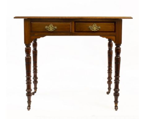 A VICTORIAN WALNUT WRITING TABLE with burgundy leather inset top, the drawer bearing a brass label for Blyth &amp; Sons., Chi