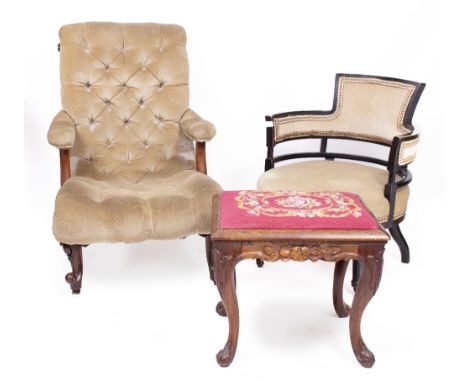 A VICTORIAN MAHOGANY FRAMED ARMCHAIR with shaped scroll back and button back upholstery, on turned legs and casters together 