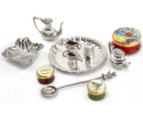 A MINIATURE SILVER TEASET by Hampton Utilities to include a tray, teapot, water jug, sugar bowl and milk jug, the tray 8.5cm 