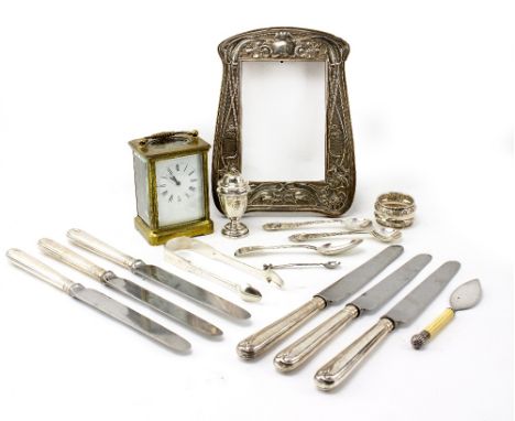 A COLLECTION OF SILVER to include and Art Nouveau photo frame, napkin ring, Birmingham silver pepperette with a finial lid, s