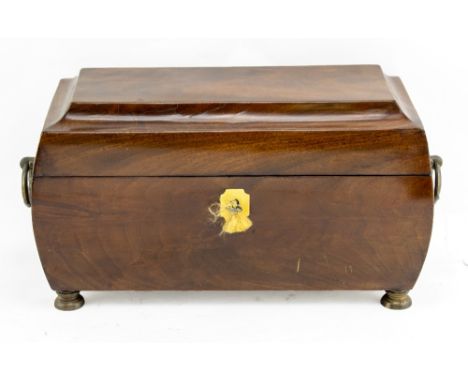 A 19TH CENTURY MAHOGANY TEA CADDY of bulbous sarcophagus form with brass escutcheon circular ring handles, standing on metal 