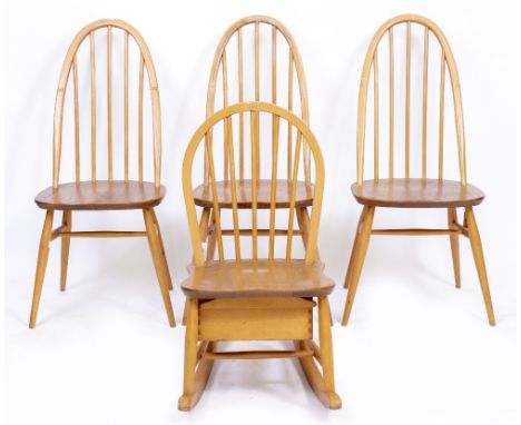 A SET OF THREE ERCOL LIGHT ELM SPINDLE BACK CHAIRS with an Ercol style rocking chair (4)