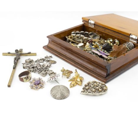 VINTAGE FAUX BOOK JEWELLERY BOX and contents within including a white metal charm bracelet, decorative brooches, brass crucif