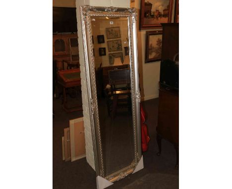 Rectangular silvered framed bevelled wall mirror, 182cm by 61cm overall