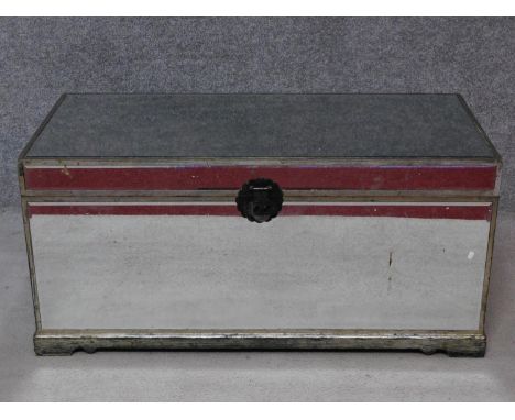 A vintage mirrored glazed lidded coffer with lift up top revealing lined interior. H.47 W.100 D.46cm 