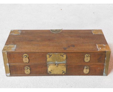 A 19th century Chinese hardwood brass bound table top chest of two long drawers. H.15 W.50 D.22cm 