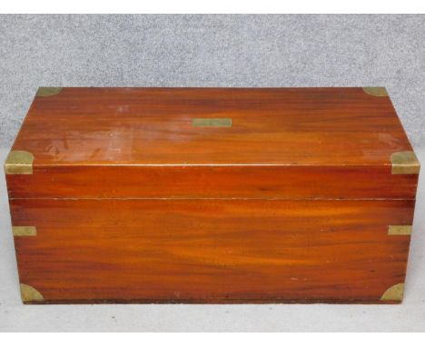 A 19th century brass bound camphorwood travelling trunk with twin carrying handles. H.45 W.107 D.50cm 