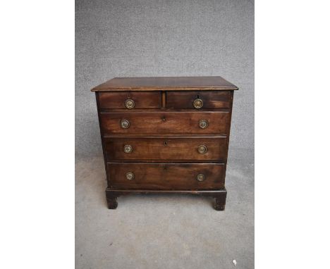 A small Georgian mahogany chest of two short over three long drawers on bracket feet. H.85x83x50cm 