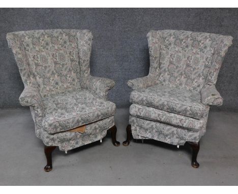 A pair of vintage beech framed Parker Knoll wingback armchairs. H.97cm 
