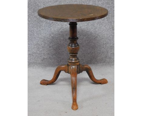 A Georgian style mahogany lamp table on tripod cabriole supports. H.56cm 