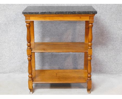 A marble topped fruitwood console table in the French Provincial style on turned front supports united by  undertiers H.100 W