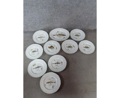 A collection of twelve vintage Marlborough Old English Ironstone Simpson Potters Ltd fish plates and a large oval serving pla