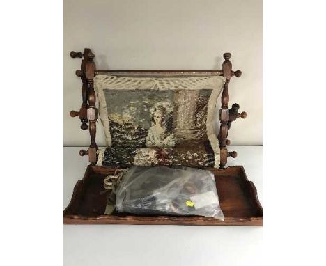 A mahogany frame with tapestry and tray