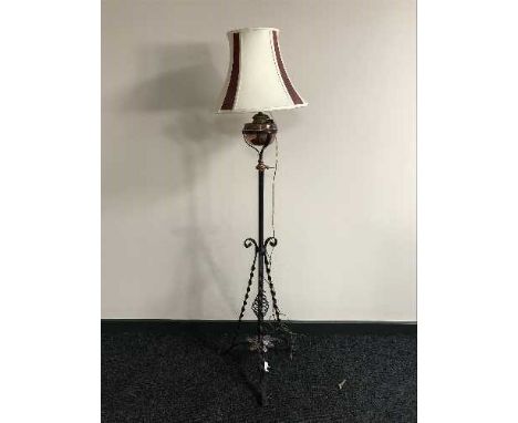 An Edwardian metal and copper floor lamp (converted) 