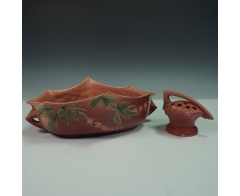 A charming Roseville Pottery Bleeding Heart planter and matching flower frog, finished in the desirable pink glaze. The Bleed
