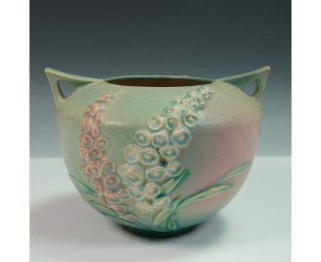 Roseville Pottery vase in the Foxglove pattern, shape number 418-6, showcasing raised foxglove blossoms in soft pink and ivor