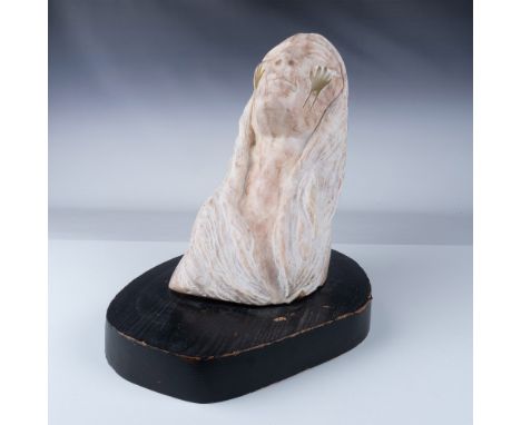 Hand carved, detailed marble sculpture in a striking depiction of a Native American figure adorned with two gold-colored hand