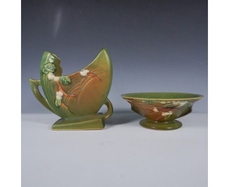 This charming 2-piece set from Roseville Pottery features the beloved Snowberry pattern in a rich green glaze, showcasing cre