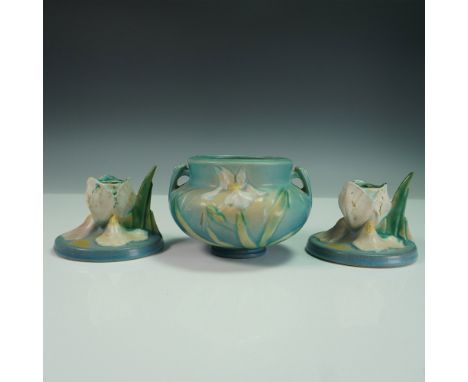 Charming three-piece set by Roseville Pottery in the sought-after Iris pattern, featuring a matching bowl and pair of candleh