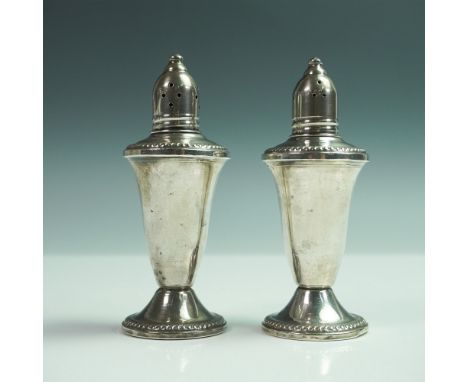 Crafted by Duchin Creation, a well-known American silversmith company renowned for mid-century sterling silver hollowware, th
