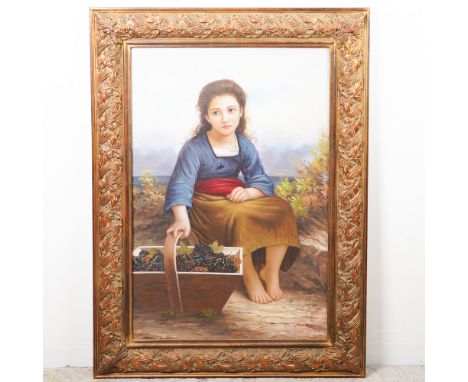 This beautifully rendered oil on canvas painting depicts a young girl seated beside a basket overflowing with ripe grapes. Th
