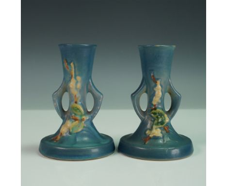 A lovely pair of Roseville Pottery Snowberry candle holders, model 1CS2, finished in the desirable blue glaze. Introduced in 