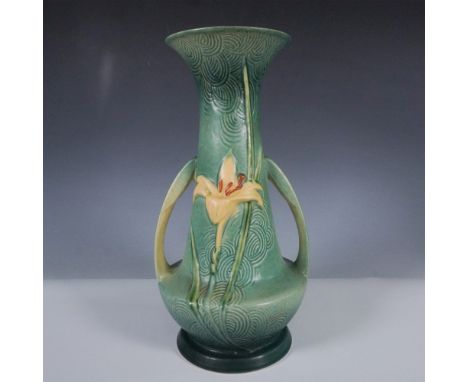 A striking Roseville Pottery Zephyr Lily vase, model 140-12, in the desirable green glaze. Introduced in 1946, the Zephyr Lil