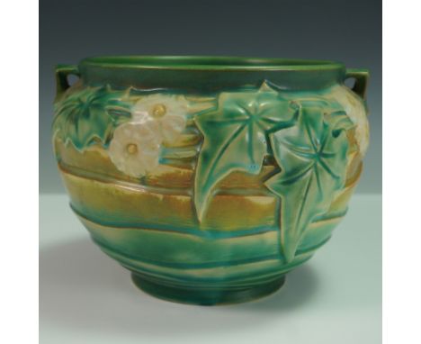 Roseville Pottery jardiniere from the Luffa pattern series, introduced in the 1940s, featuring raised white blooms and traili