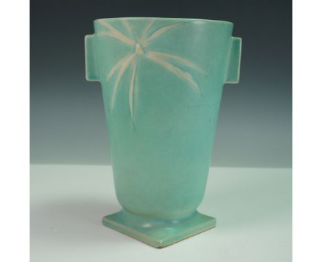 Roseville Pottery vase from the Dawn pattern, introduced in 1937, featuring a stylized palm-like motif in relief on a tall cy