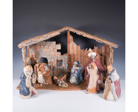 This exquisite Lladro porcelain Nativity set presents a masterful depiction of the Holy Family and the Three Wise Men in a be