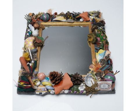 Eclectic and whimsical mixed media mirror by Victoria and Richard MacKenzie-Childs, Ltd., featuring a gold-tone square frame 
