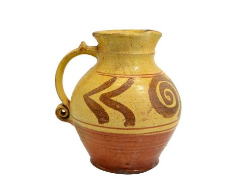 Michael Cardew for Winchcombe, a studio pottery jug, circa 1930, ovoid form, slip decorated and painted with spirals and chev