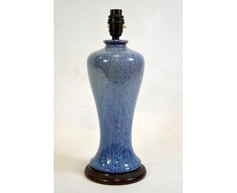 A Ruskin style high fired lamp base, inverse baluster form, on a wooden base, 39cm high to fitting